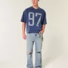 Jeans larghi strappati con lavaggio medio