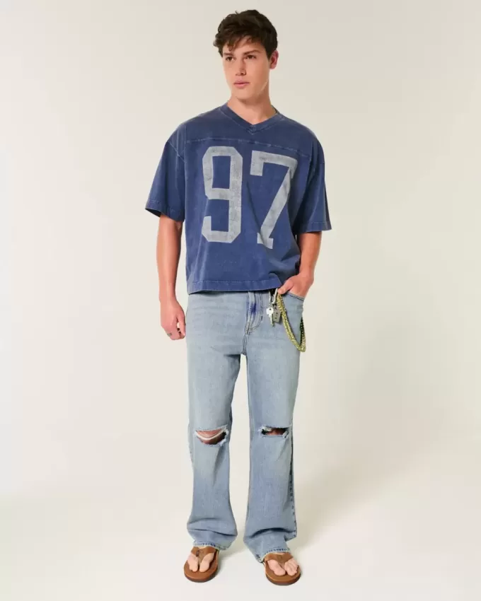 Jeans larghi strappati con lavaggio medio