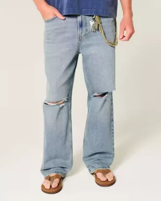 Jeans larghi strappati con lavaggio medio