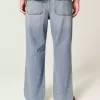 Jeans larghi strappati con lavaggio medio