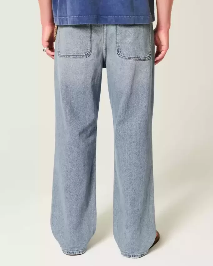 Jeans larghi strappati con lavaggio medio