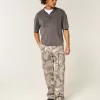 Jeans mimetici larghi da pittore