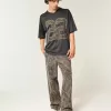 Jeans mimetici larghi da pittore