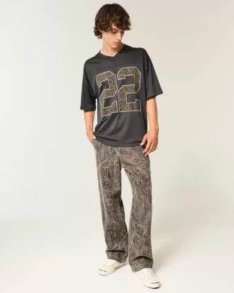 Jeans mimetici larghi da pittore