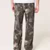 Jeans mimetici larghi da pittore