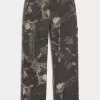 Jeans mimetici larghi da pittore