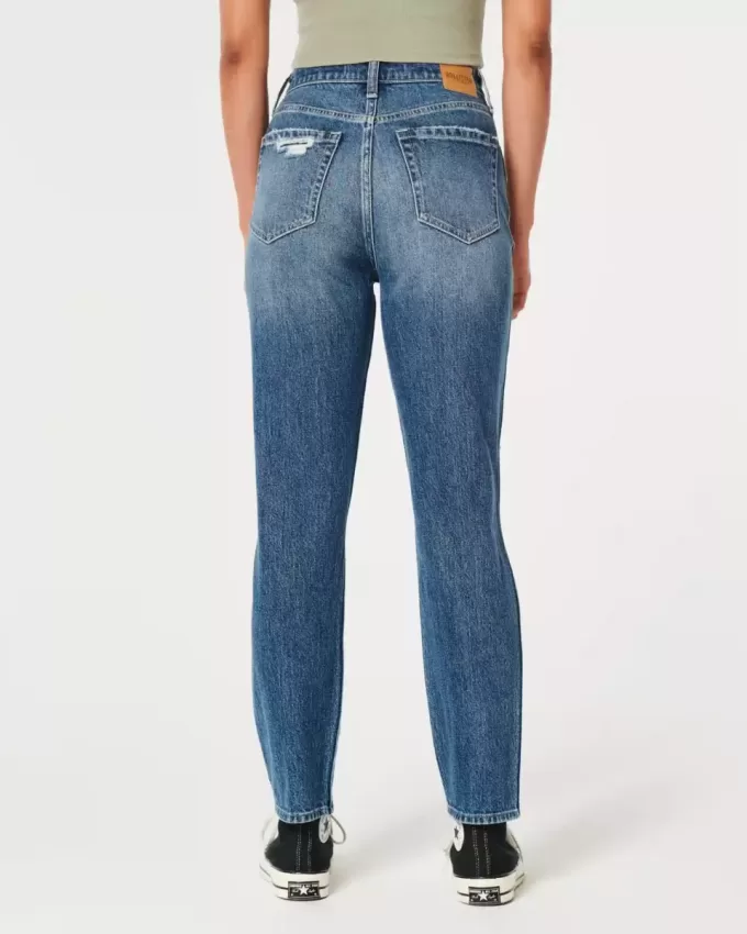 Jeans Mom a vita alta con strappi e lavaggio medio