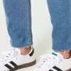 Jeans Mom Curvy a vita altissima con strappi e lavaggio medio