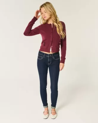 Jeans skinny lavaggio scuro a vita media