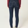 Jeans skinny lavaggio scuro a vita media Jeans skinny lavaggio scuro a vita media