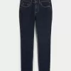 Jeans skinny lavaggio scuro a vita media Jeans skinny lavaggio scuro a vita media