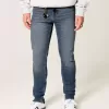 Jeans skinny sportivi lavaggio medio
