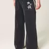 Jeans super larghi con grafica a stella nera lavata