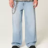 Jeans super larghi con grafica astronauta lavaggio chiaro