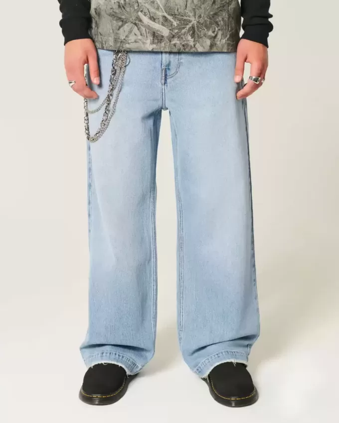 Jeans super larghi con grafica astronauta lavaggio chiaro