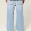 Jeans super larghi con grafica astronauta lavaggio chiaro