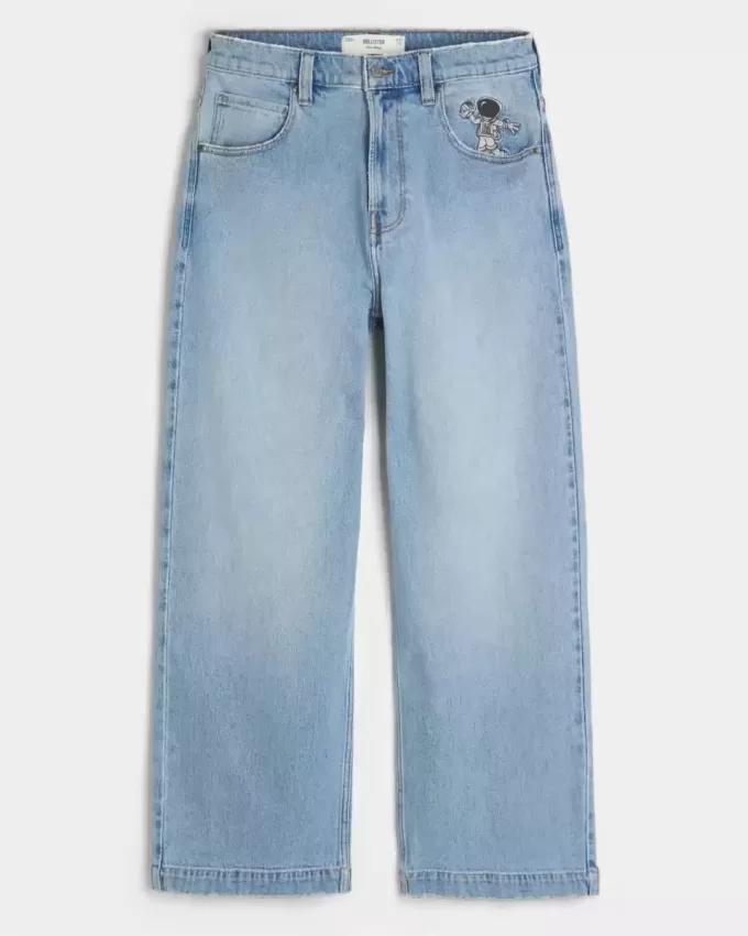 Jeans super larghi con grafica astronauta lavaggio chiaro