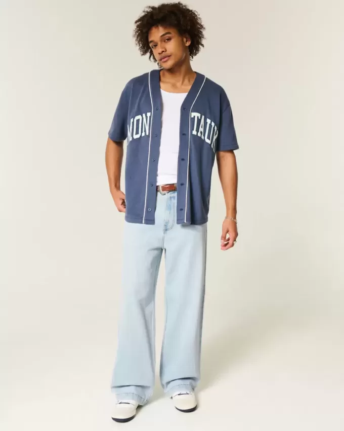 Jeans super larghi con grafica New York e lavaggio chiaro
