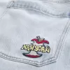Jeans super larghi con grafica New York e lavaggio chiaro
