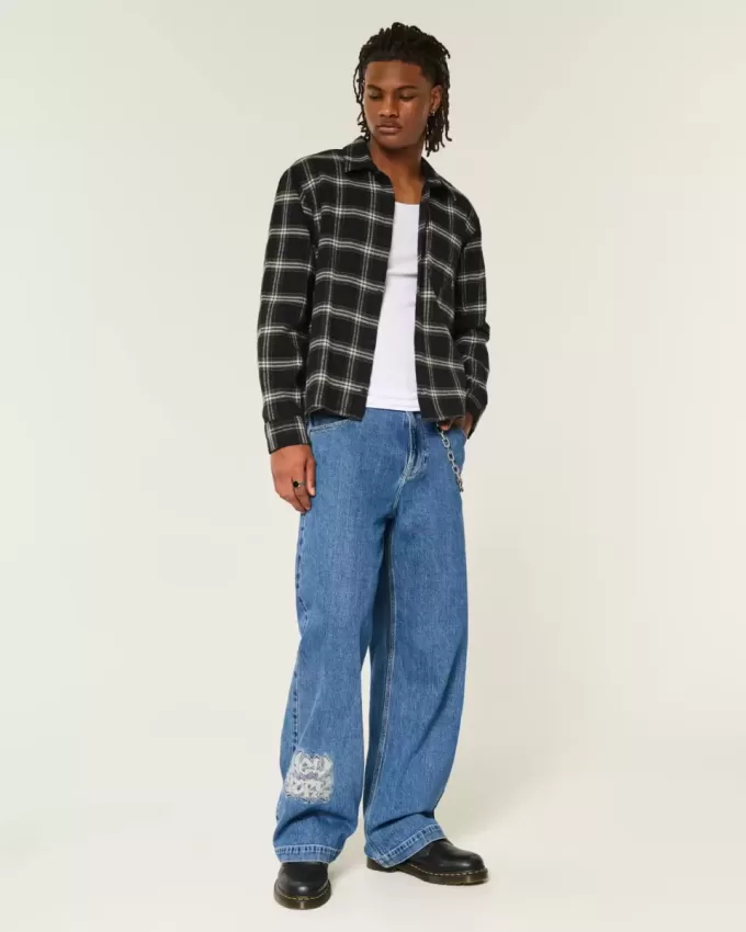 Jeans super larghi con grafica NYC e lavaggio medio