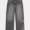 Jeans super larghi con grafica serpente