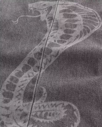 Jeans super larghi con grafica serpente