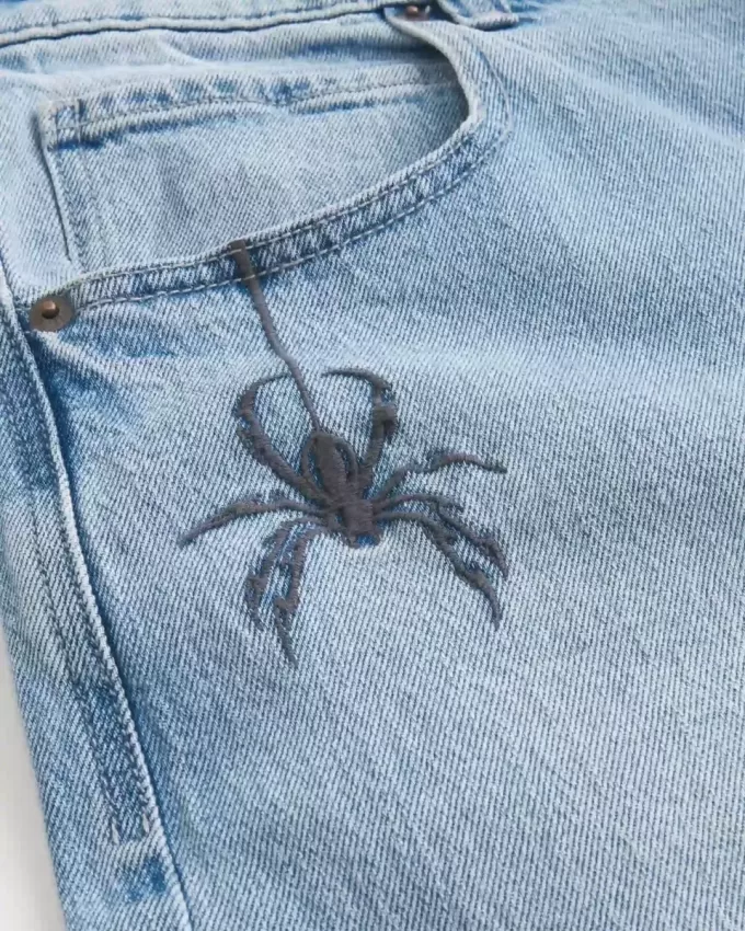 Jeans super larghi con grafica Spider Wash Light