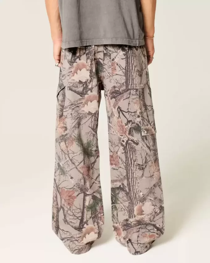 Jeans super larghi da pittore mimetici