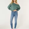 Jeans super skinny a vita alta con lavaggio medio