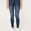 Jeans super skinny a vita alta con lavaggio medio