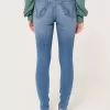 Jeans super skinny a vita alta con lavaggio medio