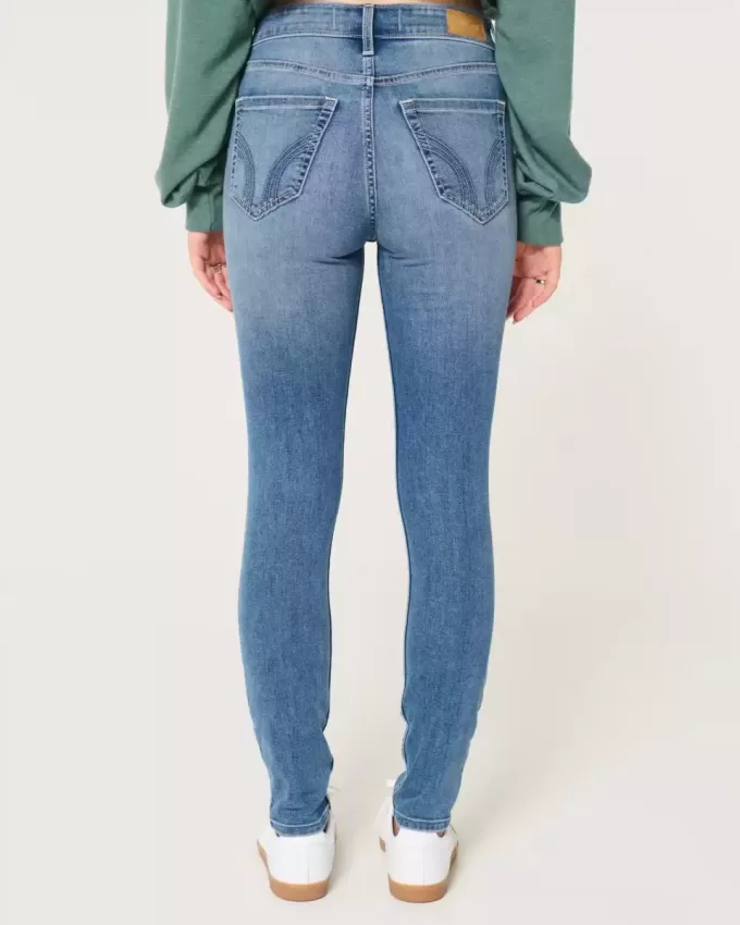 Jeans super skinny a vita alta con lavaggio medio