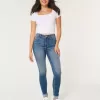 Jeans super skinny a vita alta con lavaggio medio e curve