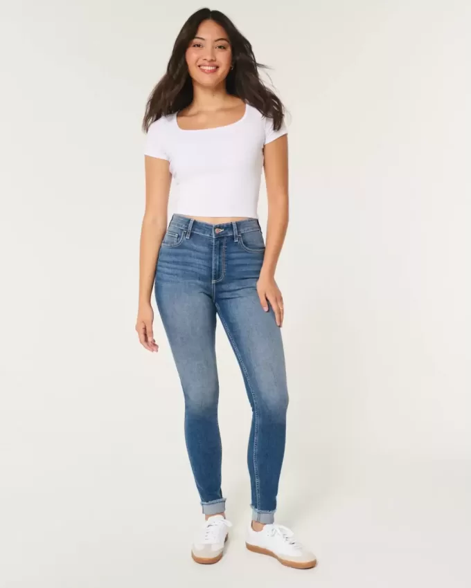 Jeans super skinny a vita alta con lavaggio medio e curve