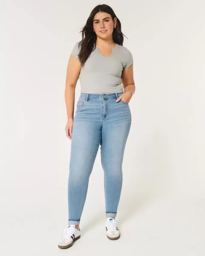 Jeans super skinny a vita alta con lavaggio medio e curve
