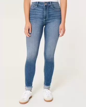 Jeans super skinny a vita alta con lavaggio medio e curve