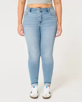 Jeans super skinny a vita alta con lavaggio medio e curve