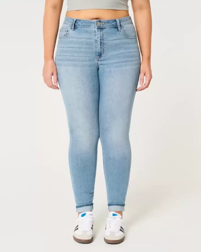 Jeans super skinny a vita alta con lavaggio medio e curve