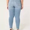 Jeans super skinny a vita alta con lavaggio medio e curve
