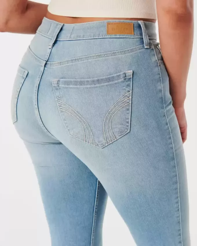 Jeans super skinny a vita alta con lavaggio medio e curve
