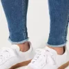 Jeans super skinny a vita alta con lavaggio medio e curve
