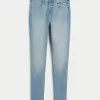 Jeans super skinny a vita alta con lavaggio medio e curve
