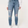 Jeans super skinny a vita alta con strappi e lavaggio medio