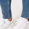 Jeans super skinny a vita alta con strappi e lavaggio medio