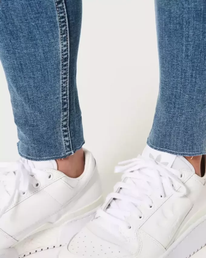 Jeans super skinny a vita alta con strappi e lavaggio medio