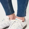 Jeans super skinny a vita alta con strappi e lavaggio medio