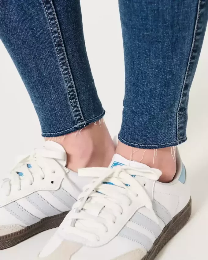 Jeans super skinny a vita alta con strappi e lavaggio medio