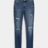 Jeans super skinny a vita alta con strappi e lavaggio medio
