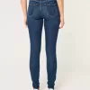 Jeans super skinny a vita alta con strappi e lavaggio scuro