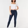 Jeans super skinny a vita alta e lavaggio scuro con effetto curvy